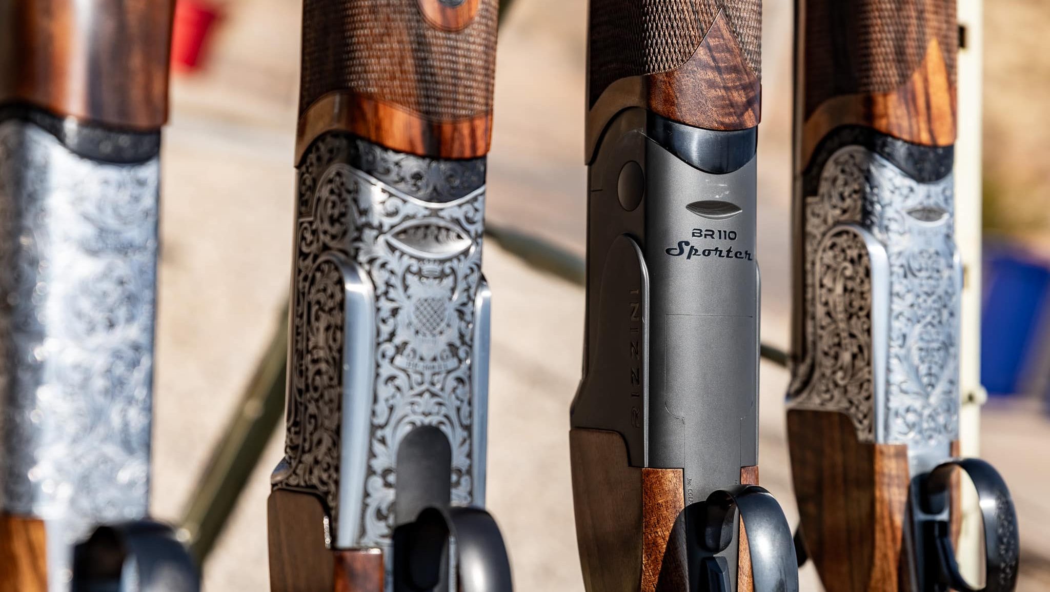 rizzini-shotguns-in-a-rack-at-event-demo