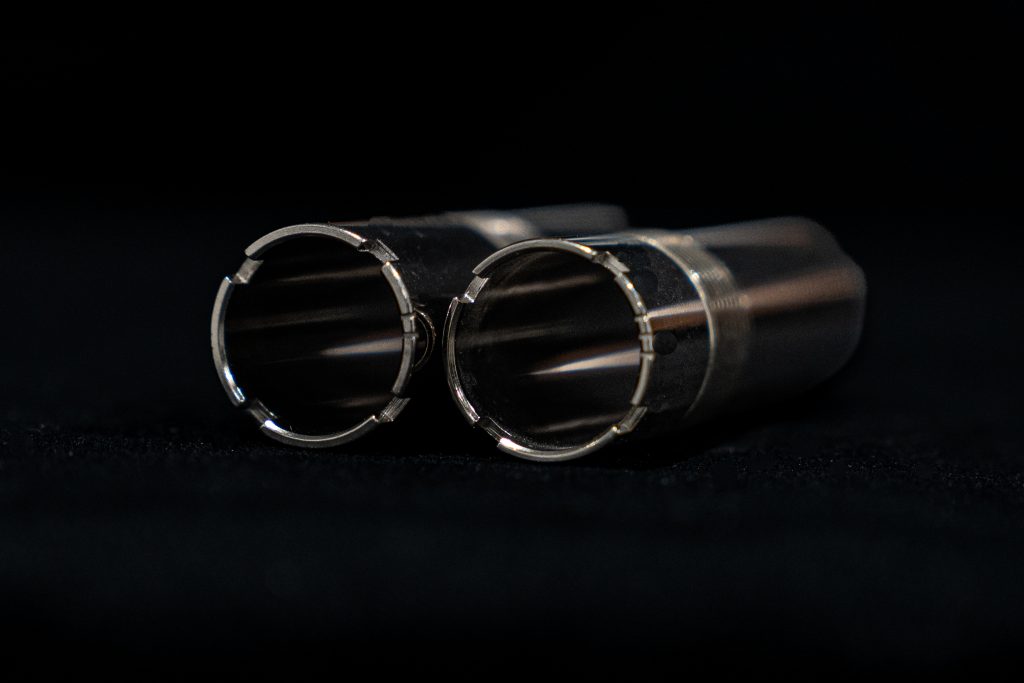 Close-up of notches filed into the muzzle rim of a Rizzini shotgun choke tube